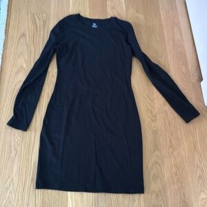 Basic black long sleeved dress. Soft material. Size L Very form fitting.